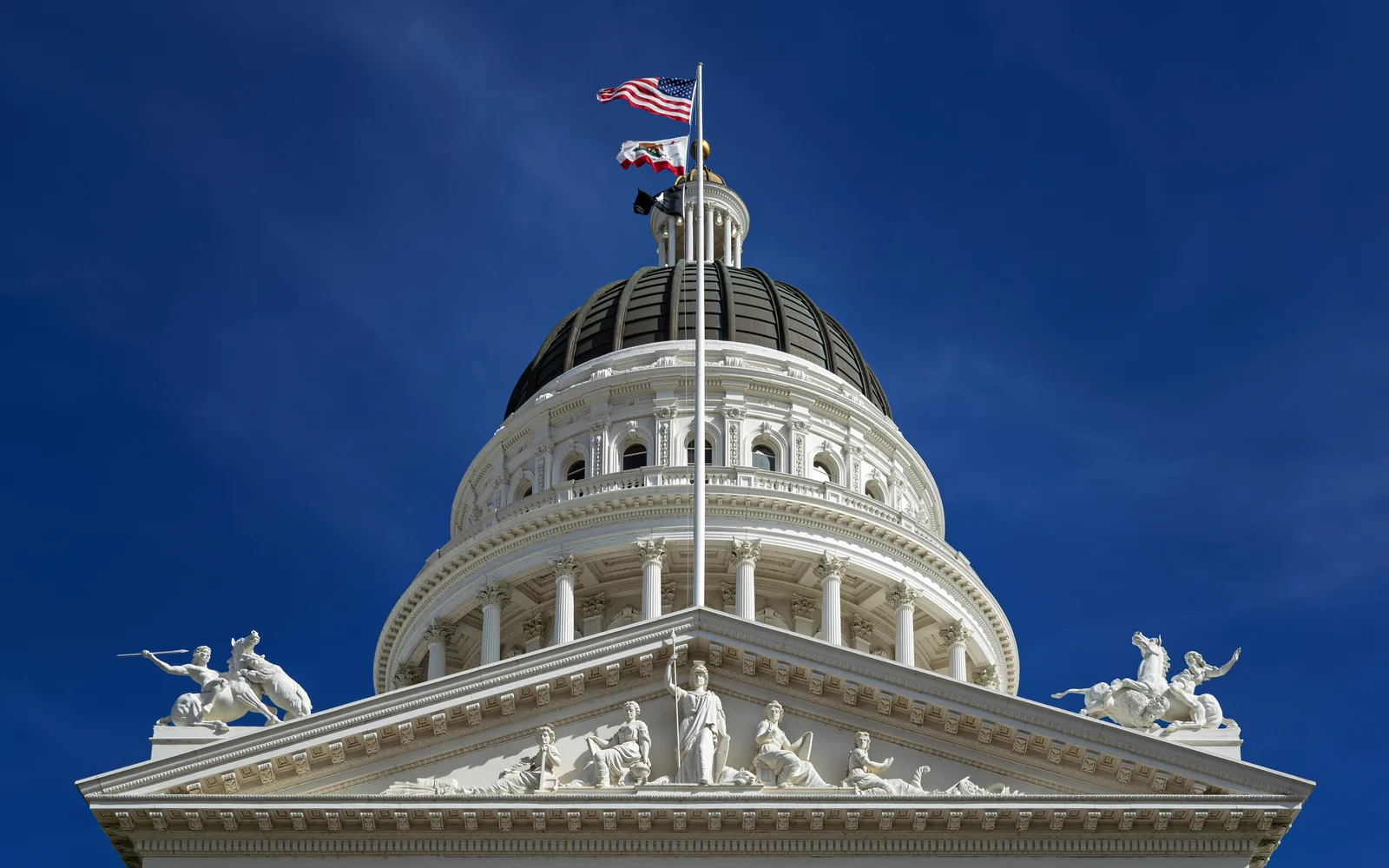 California State Capitol building in downtown Sacramento, photographed from below looking upward at the dome